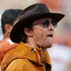 Matthew McConaughey in cowboy hat, looking pensive